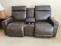 Front view of the loveseat showing both seats, center console with dual cup holders