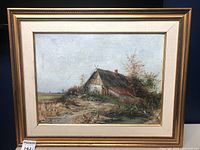 Full view of the framed oil painting showing a barn in a rural landscape with a path and trees, signed by KLOSS.