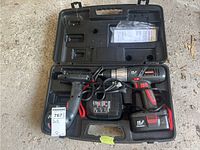 Full view of Craftsman 19.2V cordless torque drill with battery and charger in black plastic carrying case. Instruction manual visible in case lid.