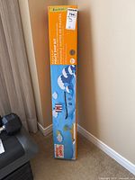 Tall sealed box showing Antsy Pants branding, kit labeled as assembly pirate ship.