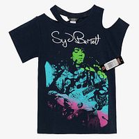Front view of the dark blue cotton t-shirt showing colorful graphic print of Syd Barrett playing guitar with white logo text, cut-out shoulder detail on right shoulder with tag attached.