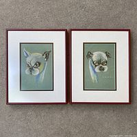 Pair of framed chalk drawings of French Bulldogs, both signed Howse, showing full lot layout on carpeted floor.