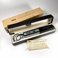 Vintage RCA Voicecaster ADX1010 wireless FM microphone in original hinged box with instruction manual inside.