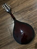 Back of mandolin showing gloss finish and body shape