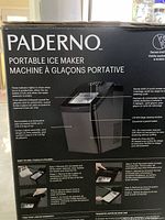 Box front and side with product details and instructions in English and French. Shows the ice maker with a removable and dishwasher-safe 4 lb ice basket and 2.8 L water reservoir.