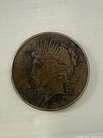 Obverse of 1924 silver Peace Dollar showing Lady Liberty with crown and year 1924.