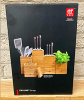 Front view of the boxed kitchen storage set showing the three bamboo blocks designed for holding utensils, herbs, and salt, with lids.