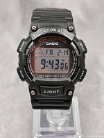 Full front view of Casio W-736H men's digital watch showing the display and bezel with vibration alarm text.