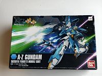 Front of box showing artwork of A-Z Gundam model kit and branding.
