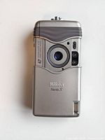 Front view of Nikon Nuvis S camera showing lens, flash and Nikon branding