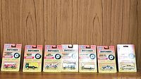 Seven Matchbox service vehicles in original packaging arranged in a row