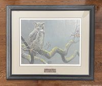 Full view of framed print on floor