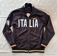 Front view of black Star Venezia men's zip-up jacket with ITALIA printed on front, Italian flag patch on left sleeve, and green-white-red stripes on cuffs and waistband.