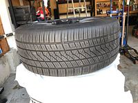 Single Continental tire mounted on BMW rim showing tread pattern