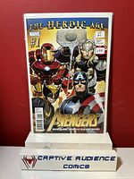 Front cover of Avengers #1 comic book showing main Avengers characters and labeling by the seller store Captive Audience Comics.