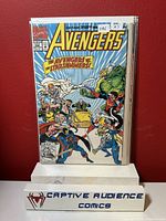 Front cover of Avengers #350 comic book sealed in protective plastic sleeve with visible price tag and condition label.