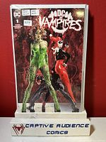 Front cover image of DC vs. Vampires #1 comic book with Marco Turini variant cover featuring Poison Ivy and Harley Quinn.