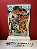 Photo of Firestorm Annual #1 comic book in protective sleeve against red background