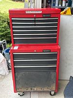 Front view of red Husky two-piece tool chest closed