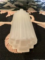 Top view showing stepped geometric design of the frosted glass light shade.