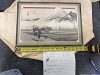 Front view of framed Japanese art print measuring about 16 inches wide.