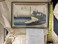 Front view of the framed artwork with measuring tape showing about 15 inches width.