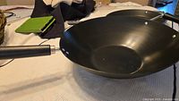 14-inch diameter non-stick wok showing inner cooking surface and handle