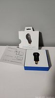 Chromecast in original box with instruction leaflet.