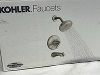 Box showing Kohler Faucets branding with showerhead, control handle, and spout image