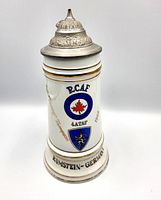 Front view showing the Royal Canadian Air Force emblem, 4 ATAF insignia, and Ramstein Germany markings on the porcelain body with gilt gold accent lines.