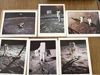 Seven color photos of Apollo moon landing astronauts and lunar module in various scenes