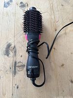 Top view of Revlon One-Step Blow Dry Brush with bristles and handle visible