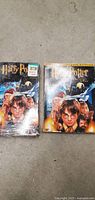 Photo showing front covers of the VHS tape and DVD case side by side, both featuring Harry Potter artwork.