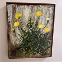 Full view of framed painting showing cluster of yellow dandelions with green leaves on mottled background.