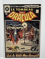 Front and top angled view of the comic book cover showing the title and artwork of Dracula in French edition.