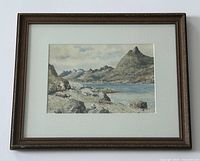 Framed watercolour painting showing entire artwork with brown wooden frame and white matting.