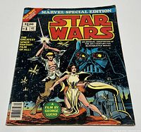 Front cover of the comic showing main characters Luke Skywalker, Princess Leia, Darth Vader, and droids with the title 'Star Wars' and special edition branding.