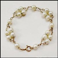 Full view of bracelet laid in a circle on white background