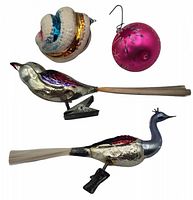 Top view showing all four vintage glass ornaments including two birds with clip-on bases, one pink teardrop, and one striped round ornament