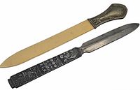 Photo showing both paper openers side by side to display full length and design contrast.