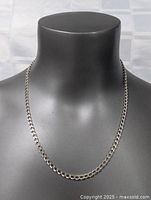 Sterling silver thick necklace chain displayed on a black mannequin bust showing front view