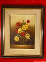 Full view of the still life floral art print in dark wooden frame with beige mat and gold trim
