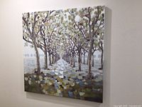 Front view of large square canvas painting showing rows of trees with fall colors.