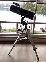 Fully assembled telescope on tripod viewed from side