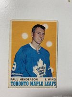 Front side of 1970-71 OPC Paul Henderson Toronto Maple Leafs hockey card showing player image and team info.