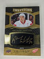 Front side of 2017-18 Upper Deck Artifacts Trilogy Tryptichs Anthony Mantha autograph card showing player image and autograph patch.