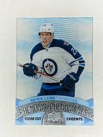 Front of 2017-18 Upper Deck Tim Hortons Patrick Laine Clear Cut Phenom CCP-3 hockey card showing player image, team name, and holographic text.