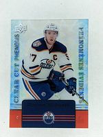 Front photo of 2019-20 Upper Deck Tim Hortons Clear Cut Phenom CC-1 hockey card featuring Connor McDavid in Edmonton Oilers uniform and holographic foil design.