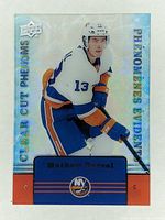 Front side of the hockey card showing player image, name, and New York Islanders logo with holographic background.
