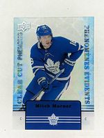 Front of hockey card showing Mitch Marner in Toronto Maple Leafs uniform, Clear Cut Phenom CC-3 holographic design